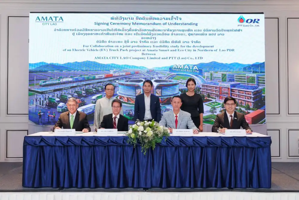 อมตะซิตี้ ลาว จับมือ พีทีที ลาว ศึกษาพัฒนา EV Truck Park หนุนโลจิสติกส์สีเขียว เชื่อมการค้าไทย-ลาว-จีน